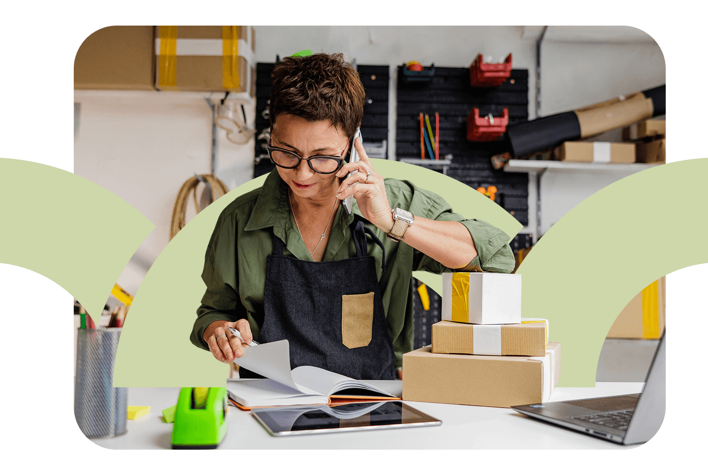Two people looking at a tablet in a warehouse