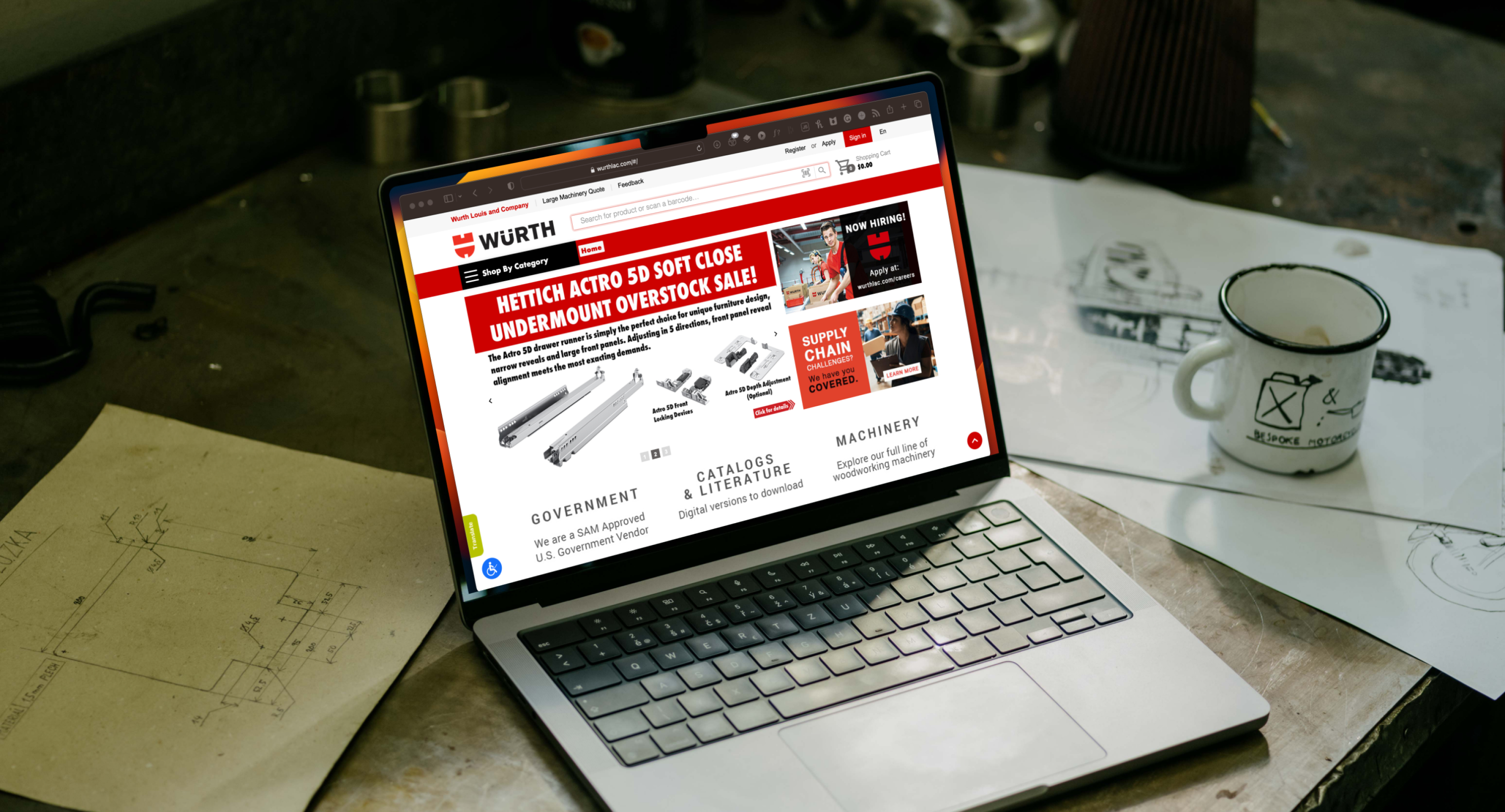 A laptop on a table with the Würth site open in the browser